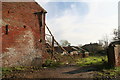 Semi-derelict farm buildings on the corner of Stockmoor Lane