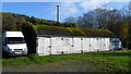 Row of old garages in Llangedwyn village