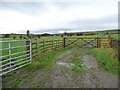 Gated track to Schoolmaster Place Farm