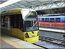 SJ8185 : Metrolink tram at The Station, Manchester Airport by Thomas Nugent