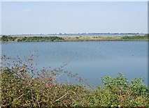 SZ8896 : Pagham Lagoon with the larger expanse  of Pagham Harbour beyond by Derek Voller