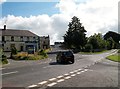 J2439 : Vehicle crossing the A50 at McBride's Corner, Moneyslane by Eric Jones