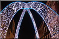 TQ2881 : View of arched Christmas decorations on South Molton Street #7 by Robert Lamb