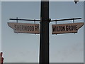 Fingerposts on the roundabout on Kingswood Road