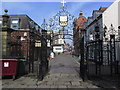 Ornate gateway to St Giles Church Wrexham, & Church St.