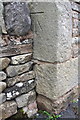 Benchmark on old stables at Daisy Farm