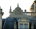 Crest of arms on the roof of Bylaugh Hall