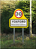 TM3968 : Yoxford Village Name sign on the A12 Main Road by Geographer