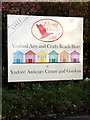 TM3869 : Yoxford Arts & Crafts Beach Huts sign at Yoxwood Antiques Centre by Geographer