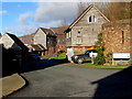 Wood clad houses in Upper House Farm, Crickhowell