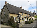 Thatched Cottages Along Main Road