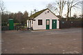 Building and old telephone box at caravan site