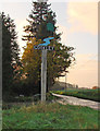 Cookley village sign in the setting sun