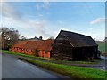 TL2506 : Stables and barn at Brewhouse Farm by Bikeboy