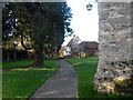 SP7325 : Churchyard of St Mary's and Beech House, East Claydon by Bikeboy