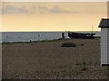 Open  Fishing  Boat  on  the  shingle  beach  at  Goring