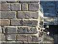 Bench mark on Cottage Lane former railway bridge