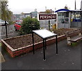 Old-style name sign and Betjeman poem display board at Pershore railway station