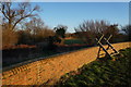 Stile over floodwall near Barlby