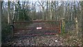 Entrance into Colliers Green Wood off Colliers Green Road Kent