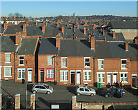 SK5641 : Over Forest Fields rooftops by John Sutton