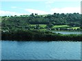 View across the Newry Canal and Newry River towards the junction of Aghnamoira Road and the A2