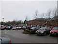 Hotel  and  car  park  on  a  wet  morning