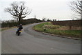 Biker on the corner near Brokenback, near West Rasen