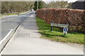 Looking along Old Lane from junction with Old Lane Gardens