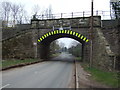 Low railway bridge crossing Cocking Hill