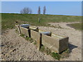 TF3535 : Concrete water tubs on Kirton Marsh, Lincolnshire by Richard Humphrey