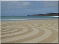 SW3526 : Sand art on the beach at Sennen Cove by Rod Allday