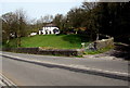 White house on a hillside near Penrhys