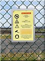 SJ8981 : Woodford Aerodrome, Security Notice on Perimeter Fence by David Dixon