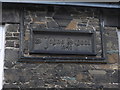 NY2623 : St John's Street: datestone on the old school by Basher Eyre