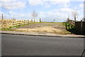 Field entrance and footpath to Woolley from Sladesbrook