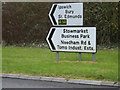 TM0659 : Roadsigns on the B1115 Stowmarket Road by Geographer