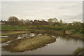 View of Alder Lodge, Eternit Walk, Fulham and the Fulham FC floodlights from Peacock Tower in the London Wetlands Centre