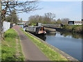 Polako - narrow boat on canal over the North Circular road