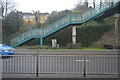 Steps to footbridge over the A386