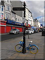 Blue and yellow bicycle on Garrison Street