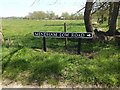 TM2683 : Mendham Low Road sign by Geographer