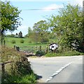 Village noticeboard at road junction in The Broad