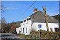 Cottage by crossroads at Tweedsmuir