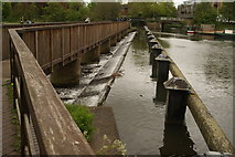 TL3213 : View of the weir between the breakwater and path on the River Lea #3 by Robert Lamb