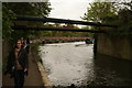 View of the path, breakwater and pipes from the Lea towpath