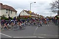 Peloton turn onto Tang Hall Lane