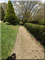 TM3372 : Churchyard path to the B1117 Church Road by Geographer