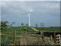 NZ0776 : Farmland and wind turbine, Hay Banks by JThomas