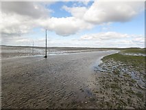 NU1142 : Water flowing across Holy Island Sands by Graham Robson